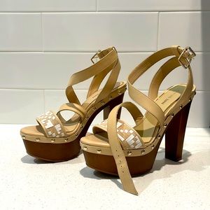 A pair of Gianni Bini heels. Has a beautiful pattern and is in great condition.